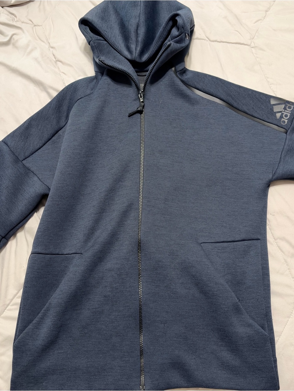 adidas ZNE training hoodie with dri-fit tech, warming pockets with thumb holes.